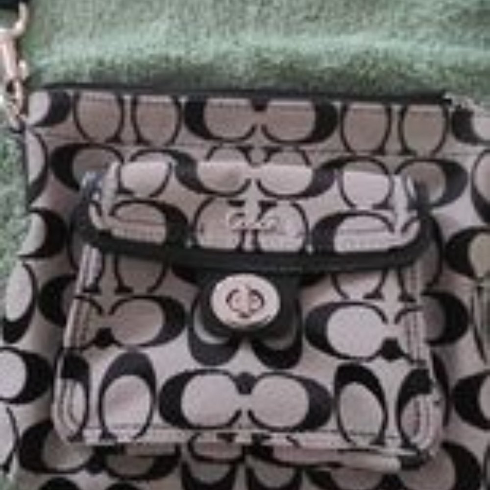 Coach black and cream cross body purse